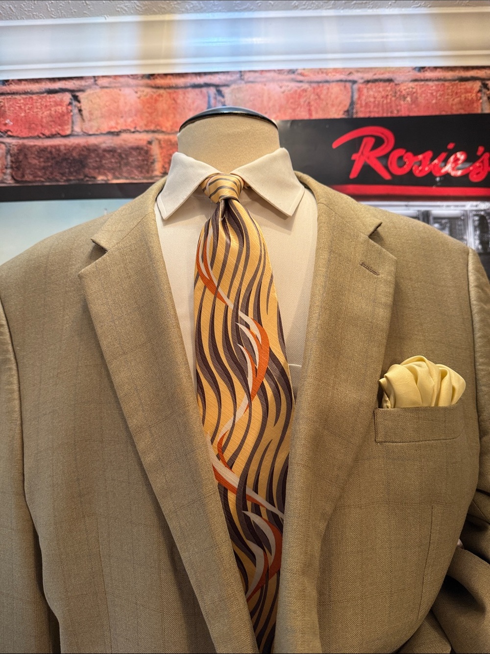 Joseph & Feiss Tan Sport Coat with Yellow and Brown Wave Tie